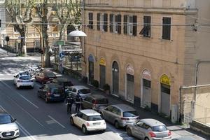 GENOA, ITALY - APRIL 9 2020 - Local police control during coronavirus covid quarentine photo