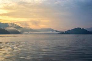 Landscape of sunrise with fog in the morning photo