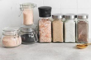 Jars with assorted speciality salt photo