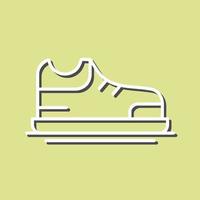 icono de vector de zapatos