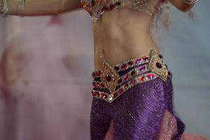 Oriental belly dancer beutiful move photo