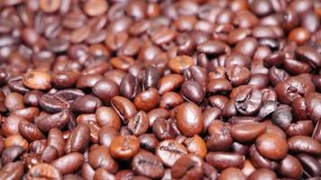 Freshly roasted coffee beans close up photo