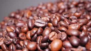 Freshly roasted coffee beans close up photo