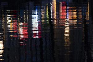 AMSTERDAM, NETHERLAND - old town canals red lights reflection photo