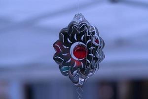 Wind chime with stone photo