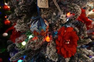 christmas tree decorations at street market photo