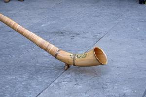 Wood mountain traditional horn musical instrument detail photo