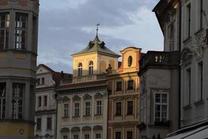 prague old buildings at sunset photo