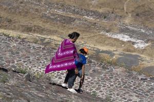 MEXICO CITY, MEXICO - JANUARY 30 2019 - Tourist climbing Teotihuacan pyramid mexico photo