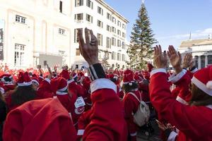 GENOA, ITALY - DECEMBER 22 2019 - Traditional Santa claus walk photo