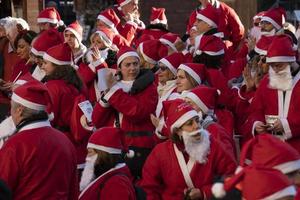 GENOA, ITALY - DECEMBER 22 2019 - Traditional Santa claus walk photo