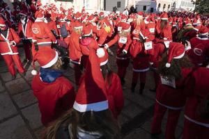 GENOA, ITALY - DECEMBER 22 2019 - Traditional Santa claus walk photo