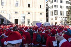 GENOA, ITALY - DECEMBER 22 2019 - Traditional Santa claus walk photo