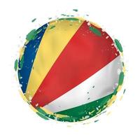 Round grunge flag of Seychelles with splashes in flag color. vector