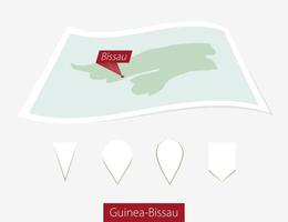 Curved paper map of Guinea-Bissau with capital Bissau on Gray Background. Four different Map pin set. vector