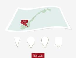 Curved paper map of Norway with capital Oslo on Gray Background. Four different Map pin set. vector