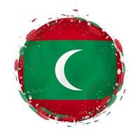Round grunge flag of Maldives with splashes in flag color. vector
