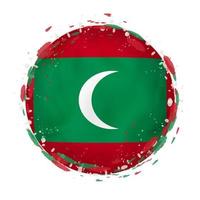 Round grunge flag of Maldives with splashes in flag color. vector