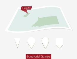 Curved paper map of Equatorial Guinea with capital Malabo on Gray Background. Four different Map pin set. vector