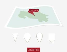 Curved paper map of Costa Rica with capital San Jose on Gray Background. Four different Map pin set. vector