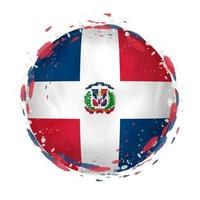 Round grunge flag of Dominican Republic with splashes in flag color. vector