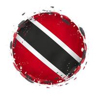 Round grunge flag of Trinidad and Tobago with splashes in flag color. vector