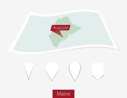 Curved paper map of Maine state with capital Augusta on Gray Background. Four different Map pin set. vector