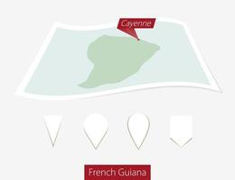 Curved paper map of French Guiana with capital Cayenne on Gray Background. Four different Map pin set. vector