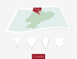 Curved paper map of Ecuador with capital Quito on Gray Background. Four different Map pin set. vector