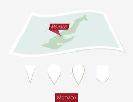 Curved paper map of Monaco with capital Monaco on Gray Background. Four different Map pin set. vector