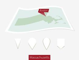 Curved paper map of Massachusetts state with capital Boston on Gray Background. Four different Map pin set. vector