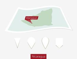 curvo papel mapa de Nicaragua con capital managua en gris antecedentes. cuatro diferente mapa alfiler colocar. vector