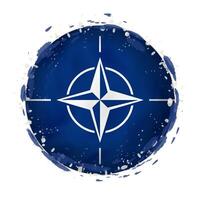 Round grunge flag of Nato with splashes in flag color. vector