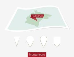 Curved paper map of Montenegro with capital Podgorica on Gray Background. Four different Map pin set. vector