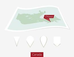 Curved paper map of Canada with capital Ottawa on Gray Background. Four different Map pin set. vector