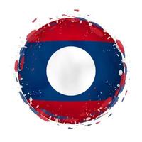Round grunge flag of Laos with splashes in flag color. vector
