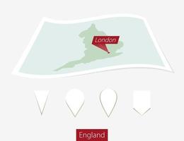 Curved paper map of England with capital London on Gray Background. Four different Map pin set. vector