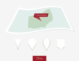 Curved paper map of Ohio state with capital Columbus on Gray Background. Four different Map pin set. vector