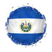 Round grunge flag of El Salvador with splashes in flag color. vector