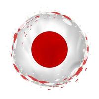 Round grunge flag of Japan with splashes in flag color. vector