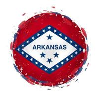 Round grunge flag of Arkansas US state with splashes in flag color. vector