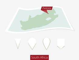Curved paper map of South Africa with capital Pretoria on Gray Background. Four different Map pin set. vector