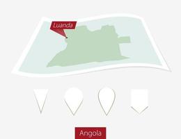 curvo papel mapa de angola con capital luanda en gris antecedentes. cuatro diferente mapa alfiler colocar. vector