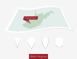 Curved paper map of West Virginia state with capital Charleston on Gray Background. Four different Map pin set. vector