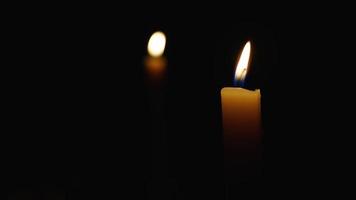 Two Candles lighing in the dark after power cut video