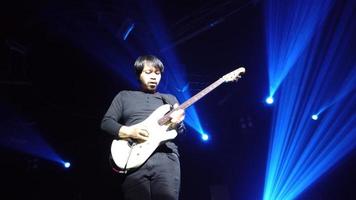 Man musicians playing guitars on stage video