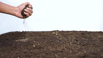 farmer hand grasping fertile soil video