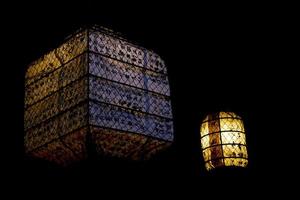 Japanese lantern glowing in the black background photo