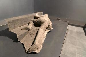pompei ruins statue buried corpse photo