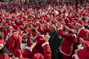 GENOA, ITALY - DECEMBER 22 2019 - Traditional Santa claus walk photo